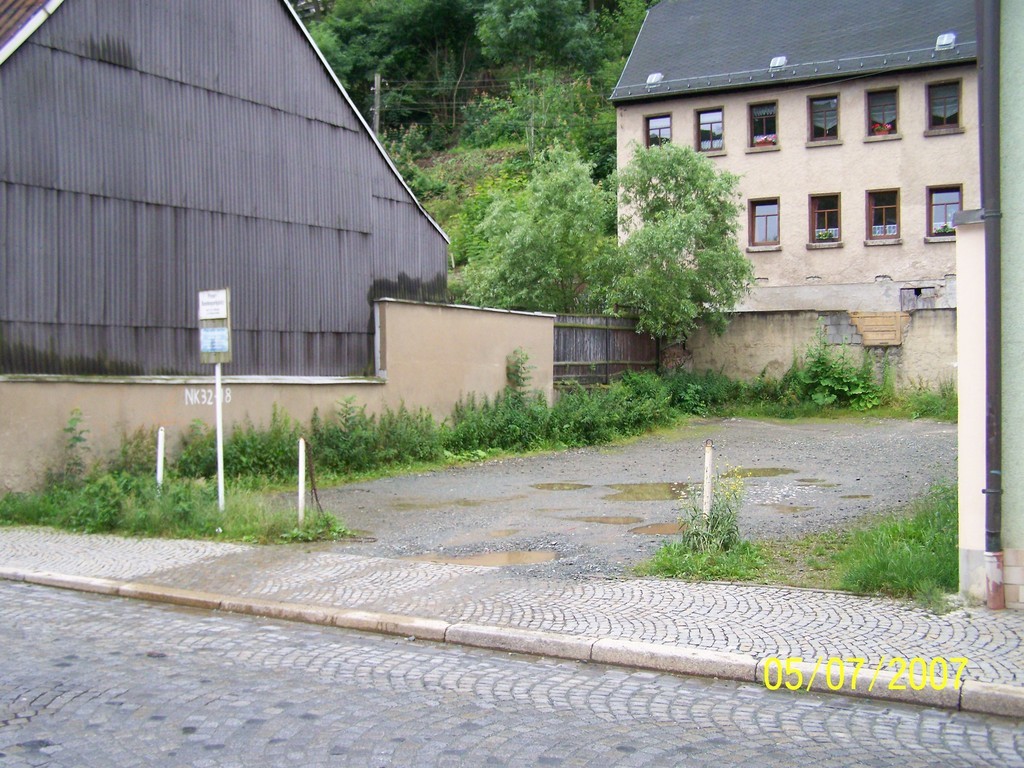 Wohn- und Geschäftshaus mit Schloßblick